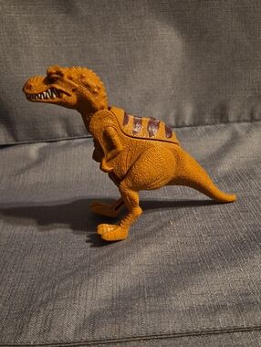 T-Rex action figure is the Momma Dino from Ice Age 3